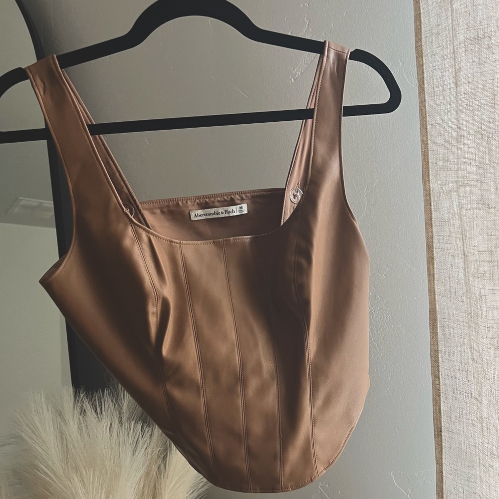Medium tan faux leather blouse